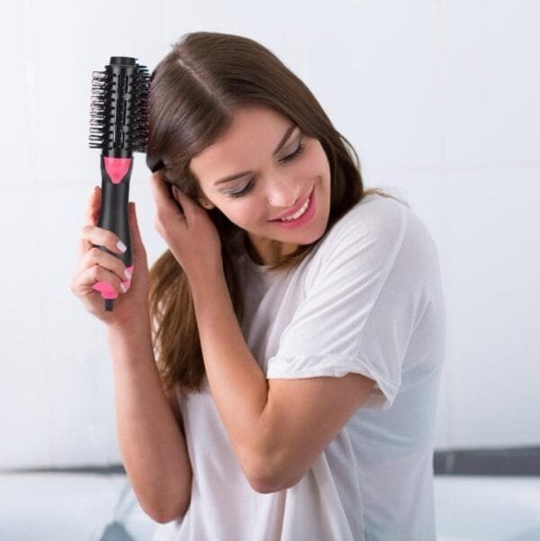 One-Step Electric Hair Dryer & Styler Combines drying, straightening, and curling in one tool. - Image 4